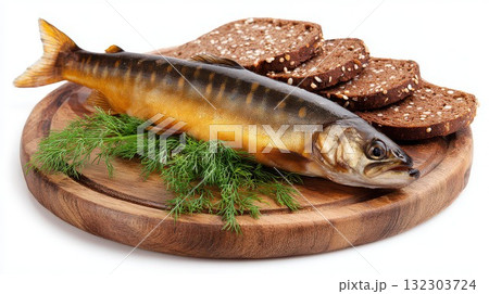 Smoked mackerel fish with rye bread and dill on wooden board, traditional Baltic cuisine with authentic presentation and natural ingredients 132303724