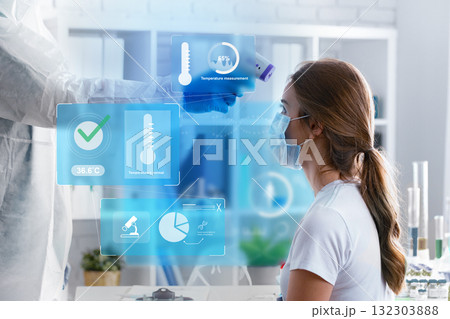 Health check using a digital thermometer in a medical setting with patient monitoring 132303888