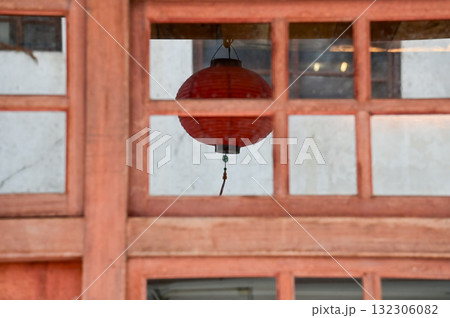 Window reflection of the traditional Chinese lantern. Colorful lanterns. Festive decoration. Mid-autumn festival decoration,Chinese New Year decoration, for celebration. Festive background concept 132306082