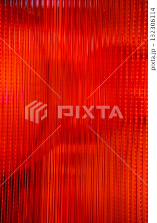 Close-up of the red semi transparent glass wall with the shape of traditional Chinese lantern. For background use. Close-up of the red semi transparent glass wall with the shape of traditional Chinese lantern. For background use. 132306114