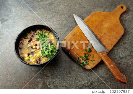 Red bean soup with potatoes, tomatoes, paprika, carrot, and bacon. Red bean soup with potatoes, tomatoes, paprika, carrot, and bacon. 132307927