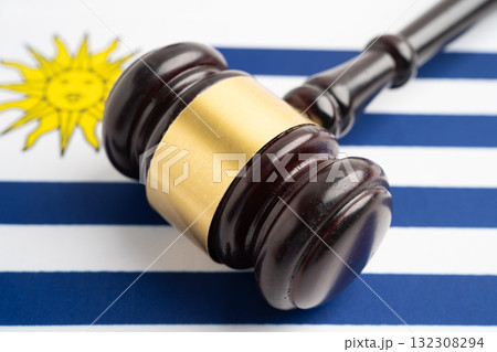 Uruguay Legal, justice and agreement, wooden court gavel on flag. Uruguay Legal, justice and agreement, wooden court gavel on flag. 132308294