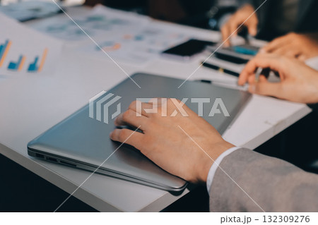 Accounting company provide finance and taxation planning for profitable cash flow, Auditor and accountant team working in office, analyze financial data and accounting record with calculator.Insight 132309276