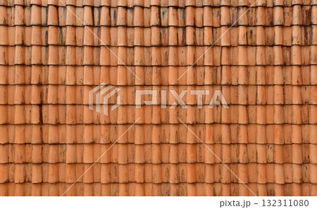 Old orange roof tiles with water stains dirt Old orange roof tiles with water stains dirt 132311080