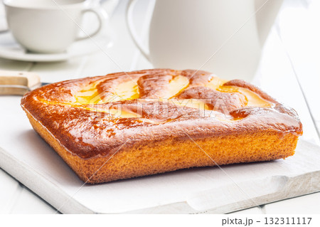 Catalana sponge cake on white table. Catalana sponge cake on white table. 132311117