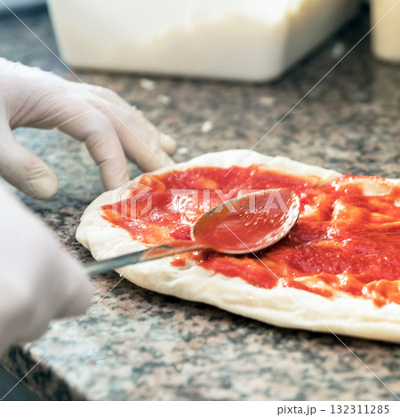 Pizza preparation 132311285