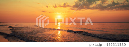 Seascape in the early morning. Sunrise over the sea. Nature landscape. Horizontal banner 132311580