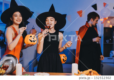 Joyful office Halloween party with coworkers in costumes, celebrating with drinks and laughter, fostering teamwork and festive spirit 132312302