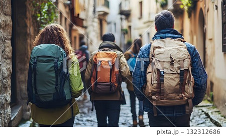 Group of Hikers Exploring a Narrow European Alleyway Group of Hikers Exploring a Narrow European Alleyway 132312686