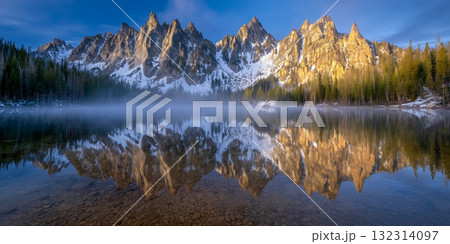 Mountain Range Reflected in Calm Lake at Sunrise Mountain Range Reflected in Calm Lake at Sunrise 132314097