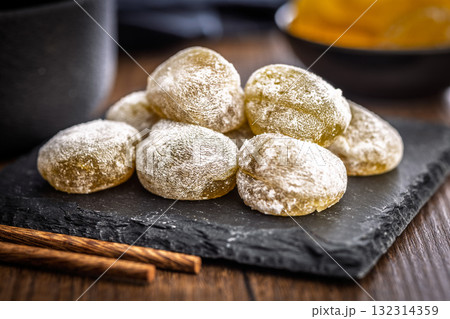Japanese mochi dessert on plate on wooden table. Japanese mochi dessert on plate on wooden table. 132314359