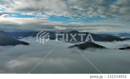 Aerial view of clouds and mountains at sunrise 132314932