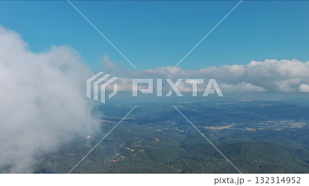 Clouds and mountains, flying in clouds 132314952