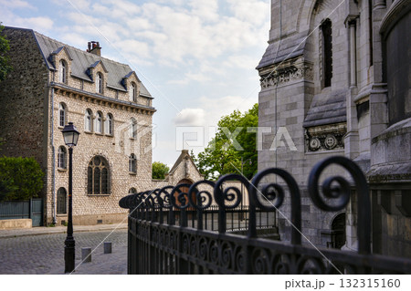 Historic stone buildings and iron fence in Montmartre Paris Historic stone buildings and iron fence in Montmartre Paris 132315160