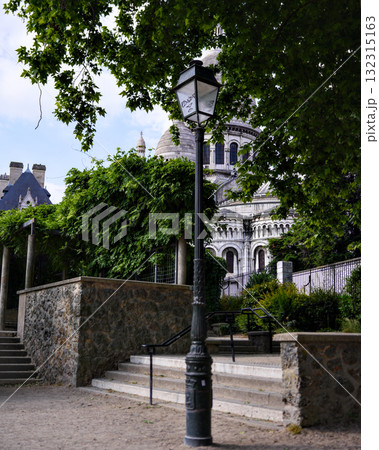 Stone stairs and street lamp leading to Sacre Coeur Basilica in Montmartre Paris 132315163