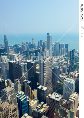 Majestic skyline of Chicago meets the calm waters of Lake Michigan on a bright summer day Majestic skyline of Chicago meets the calm waters of Lake Michigan on a bright summer day 132315670