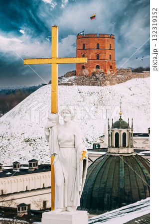 Vilnius Lithuania. Close Pediment Of Cathedral Basilica Of St. Stanislaus, St. Vladislav With Statues Of St. Elena And St. Stanislaus ,Tower Of Gediminas Or Gedimino In Winter Day Vilnius Lithuania. Close Pediment Of Cathedral Basilica Of St. Stanislaus, St. Vladislav With Statues Of St. Elena And St. Stanislaus ,Tower Of Gediminas Or Gedimino In Winter Day 132319152