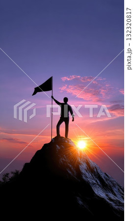 A person stands triumphantly on a mountain top at sunset, holding a flag high in the air. 132320817