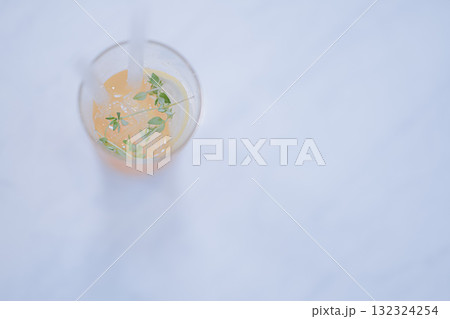 ice juice on white table in modern coffee shop 132324254