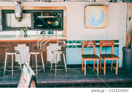 modern workspace architecture design with classic chair and wooden bar at front of shop modern workspace architecture design with classic chair and wooden bar at front of shop 132324267