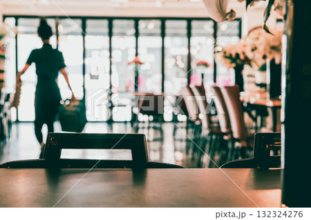 modern workspace architecture design with wooden bar with soft focus employee and coffee shop decorate background modern workspace architecture design with wooden bar with soft focus employee and coffee shop decorate background 132324276