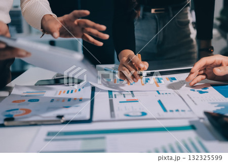 Accounting company provide finance and taxation planning for profitable cash flow, Auditor and accountant team working in office, analyze financial data and accounting record with calculator.Insight 132325599