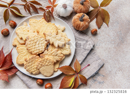 Autumn cookies shaped as leaves and acorns 132325816