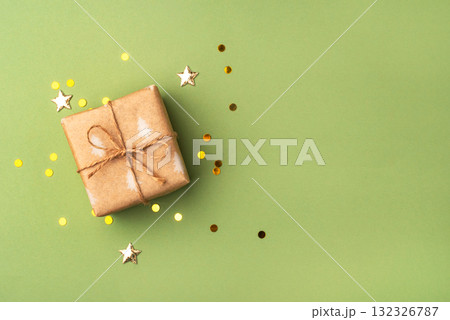A Christmas gift wrapped in eco-friendly packaging 132326787