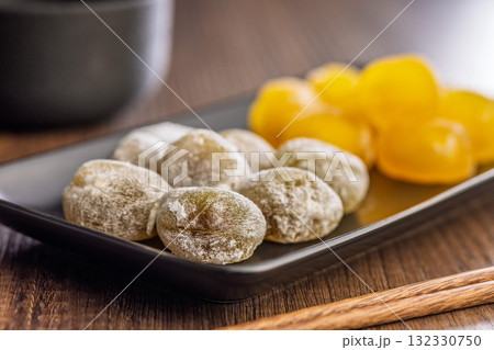 Japanese mochi dessert on plate on wooden table. 132330750