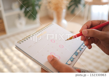 Planning important dates in a cozy indoor setting 132330963