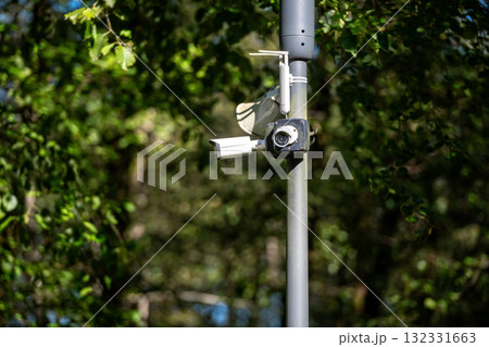 Surveillance camera security cam in the park Surveillance camera security cam in the park 132331663