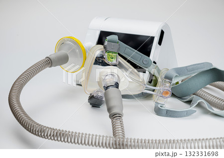 Continuous positive airway pressure system includes of CPAP machine, mask, tube on white background Continuous positive airway pressure system includes of CPAP machine, mask, tube on white background 132331698