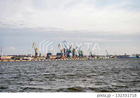 Industrial landscape with cranes in the port of Klaipeda, Lithuania 132331718