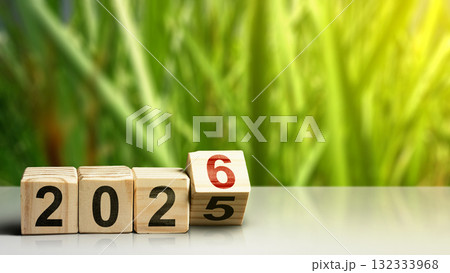 Wooden cubes transform from the number 2025 to 2026 on the table with a blurred background. Happy New Year concept or Celebration Wooden cubes transform from the number 2025 to 2026 on the table with a blurred background. Happy New Year concept or Celebration 132333968