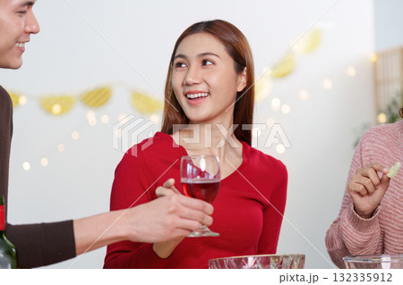 Happy New Year Celebration with Friends and Drinks 132335912