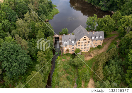 The ancient Katrina mill building in a picturesque location by the lake, Krimulda, Latvia The ancient Katrina mill building in a picturesque location by the lake, Krimulda, Latvia 132336577