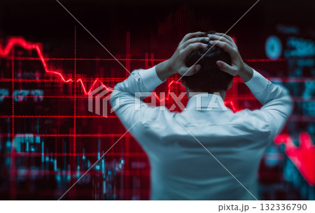 世界的な市場崩壊を象徴する赤い株価チャートとビジネスマンのイメージ 世界的な市場崩壊を象徴する赤い株価チャートとビジネスマンのイメージ 132336790