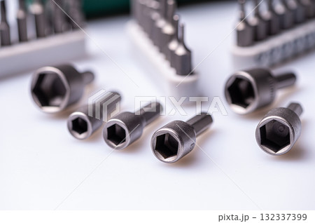 Interchangeable screwdriver bit set, isolated on white, selective focus,  dof, closeup 132337399