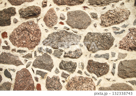 Old stone wall of an ancient European fortress 132338743