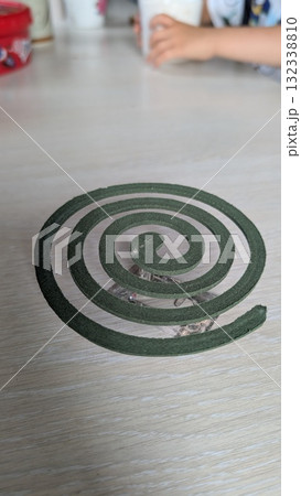 The Spiral Design on the surface of the table serves as a captivating artistic element 132338810