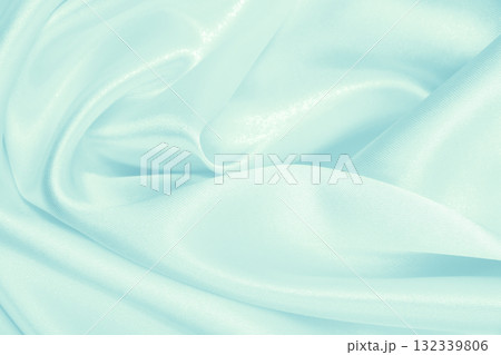 Smooth elegant blue silk or satin luxury cloth texture as abstract background. Luxurious background design Smooth elegant blue silk or satin luxury cloth texture as abstract background. Luxurious background design 132339806