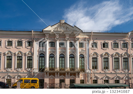 Beautiful architectural details of a historic building in Saint Petersburg under a bright blue sky during the day 132341087