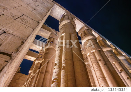 Illuminated Papyrus Columns at Temple of Luxor Egypt Night Sky View. Illuminated Papyrus Columns at Temple of Luxor Egypt Night Sky View. 132343324