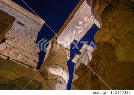 Dramatic Low Angle View of Luxor Temple Megaliths and Lintel at Night. Dramatic Low Angle View of Luxor Temple Megaliths and Lintel at Night. 132343335
