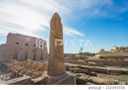 Obelisk and ram headed sphinxes at Karnak Temple Complex Luxor Egypt. 132343358