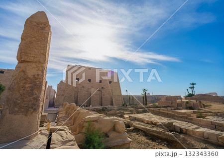 Obelisk and ram headed sphinxes at Karnak Temple Complex Luxor Egypt. 132343360