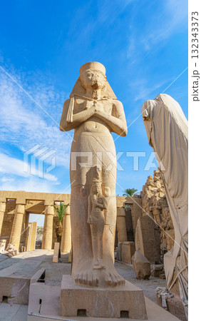 Colossal Ramesses II statue with Queen Nefertari at Karnak Temple Luxor Egypt. 132343373