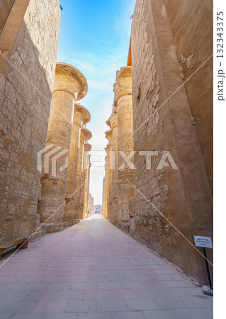 Grand column walkway in the Great Hypostyle Hall Karnak Temple Luxor Egypt. Grand column walkway in the Great Hypostyle Hall Karnak Temple Luxor Egypt. 132343375