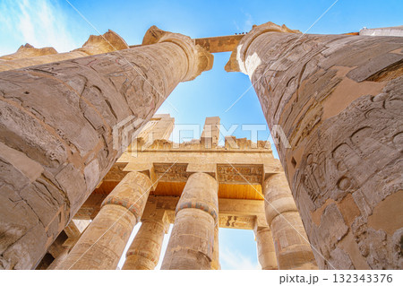 Looking up at colossal columns of the Great Hypostyle Hall Karnak Temple Luxor Egypt. Looking up at colossal columns of the Great Hypostyle Hall Karnak Temple Luxor Egypt. 132343376