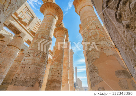 Papyrus columns and hieroglyphs in the Great Hypostyle Hall Karnak Temple Luxor. 132343380